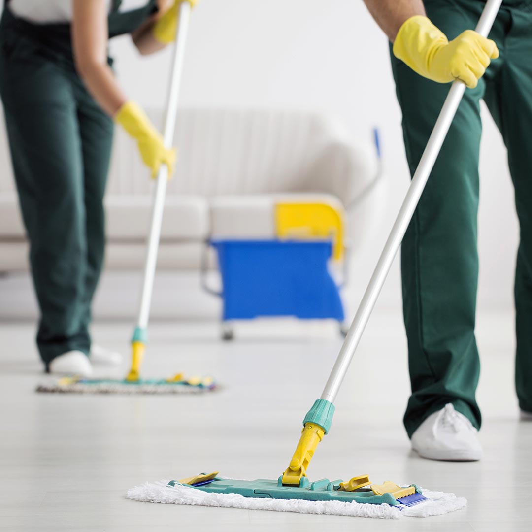 Cleaning crew cleaning floors